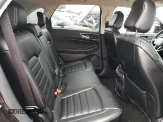 2020 Ford Edge SEL с VIN 2FMPK4J90LBA34676, выставлен на аукционе Copart как лот 55577665 с пробегом 113 214 миль миль и Списание • Salvage title. История ставок и продаж доступна на DreamBid. Изображение 11.