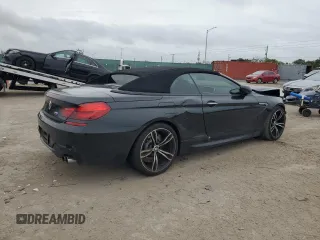 2015 BMW M6 z VIN WBSLZ9C52FD651302, wystawiony jako Copart lot #79278924 z przebiegiem 34 033 mil mil oraz Szkoda całkowita • Salvage title. Historia ofert i sprzedaży dostępna na DreamBid. Obrazek 3.