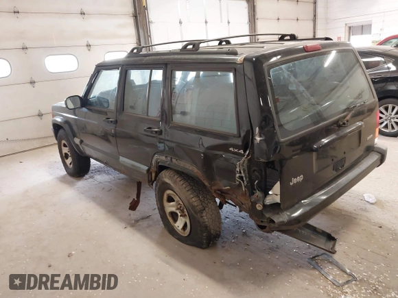 1999 Jeep Cherokee Sport z VIN 1J4FF68S4XL668081, wystawiony jako IAAI lot #42304649 z przebiegiem 194 470 mil mil oraz . Historia ofert i sprzedaży dostępna na DreamBid. Obrazek 3.