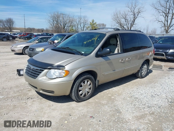2005 Chrysler Town & Country Touring with VIN 2C4GP54LX5R132272, listed as a IAAI auction lot 41860741 with 138,402 mi miles and . Bid and sale history available at DreamBid. Image 2.