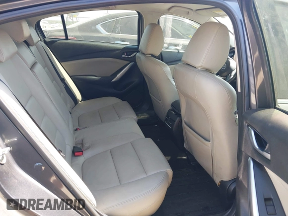 2014 Mazda 6 i Touring with VIN JM1GJ1V55E1105379, listed as a IAAI auction lot 42010585 with 153,870 mi miles and . Bid and sale history available at DreamBid. Image 8.