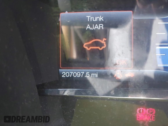 2015 Lincoln MKS with VIN 1LNHL9DKXFG607951, listed as a IAAI auction lot 40807752 with 207,097 mi miles. Bid and sale history available at carsss.com. Image 14.