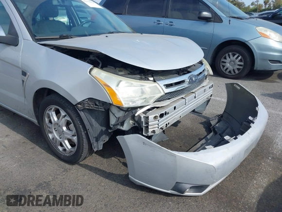 2008 Ford Focus SE with VIN 1FAHP35N98W243888, listed as a IAAI auction lot 42370178 with 141,269 mi miles and . Bid and sale history available at DreamBid. Image 13.