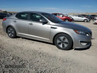 2013 Kia Optima Hybrid LX with VIN KNAGM4AD2D5047841, listed as a Copart auction lot 77695564 with 140,489 mi miles and Clean Title. Bid and sale history available at carsss.com. Image 4.