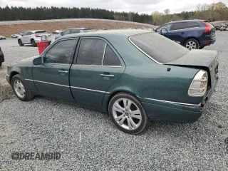 1995 Mercedes-Benz C 230/260/280/320 with VIN WDBHA28E3SF241951, listed as a Copart auction lot 50332845 with 236,068 mi miles and Salvage title. Bid and sale history available at DreamBid. Image 2.