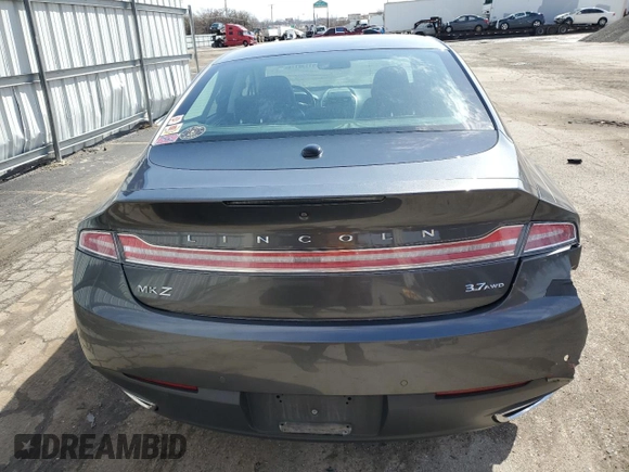 2015 Lincoln MKZ z VIN 3LN6L2JKXFR600669, wystawiony jako Copart lot #51130115 z przebiegiem 75 176 mil mil oraz Szkoda całkowita • Salvage title. Historia ofert i sprzedaży dostępna na DreamBid. Obrazek 6.