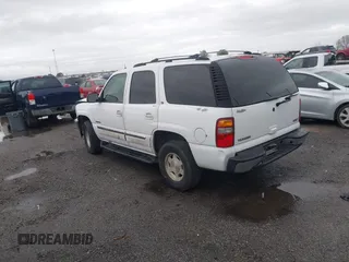 2003 GMC Yukon SLT with VIN 1GKEC13Z13J197955, listed as a IAAI auction lot 41953835 with 208,752 mi miles. Bid and sale history available at carsss.com. Image 3.