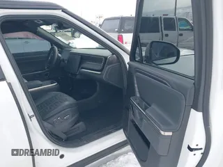 2023 Rivian R1S Adventure z VIN 7PDSGABA9PN015327, wystawiony jako IAAI lot #41484133 z przebiegiem Nie podano mil oraz . Historia ofert i sprzedaży dostępna na DreamBid. Obrazek 5.