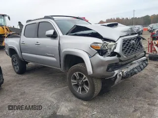 2018 Toyota Tacoma SR5 with VIN 3TMAZ5CN0JM062043, listed as a IAAI auction lot 40911519 with 176,743 mi miles and . Bid and sale history available at DreamBid. Image 1.