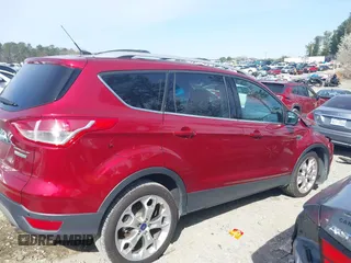 2016 Ford Escape Titanium with VIN 1FMCU0J93GUB11073, listed as a IAAI auction lot 41751349 with 92,000 mi miles. Bid and sale history available at carsss.com. Image 13.