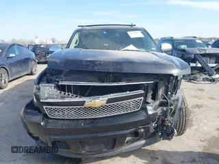 2011 Chevrolet Suburban LTZ with VIN 1GNSCKE03BR117338, listed as a IAAI auction lot 41878479 with 182,327 mi miles. Bid and sale history available at carsss.com. Image 12.