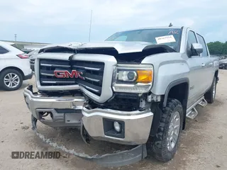 2014 GMC Sierra 1500 SLT with VIN 3GTU2VEC2EG100051, listed as a IAAI auction lot 40363924 with 149,636 mi miles and . Bid and sale history available at DreamBid. Image 6.