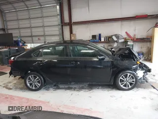 2022 Kia Forte LXS with VIN 3KPF24AD6NE467743, listed as a IAAI auction lot 42019354 with 36,496 mi miles and . Bid and sale history available at DreamBid. Image 14.