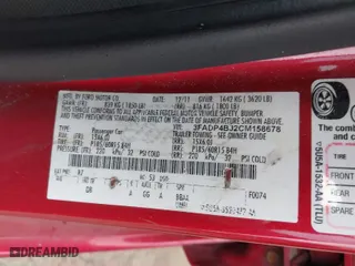 2012 Ford Fiesta SE with VIN 3FADP4BJ2CM158678, listed as a IAAI auction lot 41858203 with 144,458 mi miles. Bid and sale history available at carsss.com. Image 9.