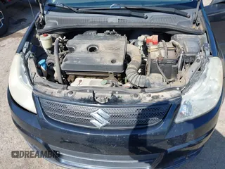 2008 Suzuki SX4 Regional Edition Touring with VIN JS2YA413985101364, listed as a IAAI auction lot 41966448 with 92,764 mi miles. Bid and sale history available at carsss.com. Image 10.