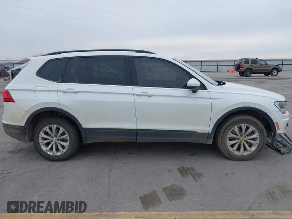 2020 Volkswagen Tiguan S with VIN 3VV1B7AX5LM079123, listed as a IAAI auction lot 41957273 with 89,449 mi miles and . Bid and sale history available at DreamBid. Image 13.