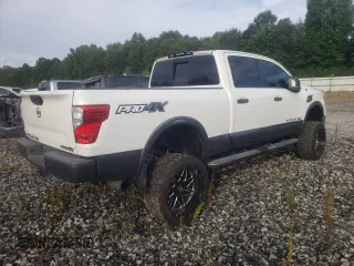 2016 Nissan Titan XD PRO-4X with VIN 1N6BA1F47GN511091, listed as a Copart auction lot 70413644 with 204,561 mi miles and Clean Title. Bid and sale history available at carsss.com. Image 3.