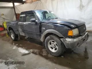 2002 Ford Ranger with VIN 1FTZR15U52PA08409, listed as a Copart auction lot 87858015 with 128,892 mi miles and Salvage Title. Bid and sale history available at DreamBid. Image 4.