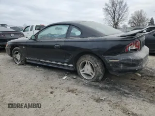 1997 Ford Mustang with VIN 1FALP4042VF198111, listed as a Copart auction lot 44245505 with 99,501 mi miles and Salvage Title. Bid and sale history available at carsss.com. Image 2.