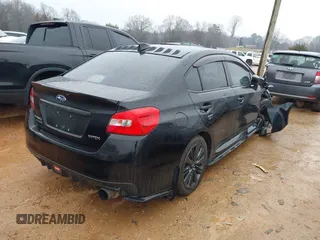 2018 Subaru WRX Premium with VIN JF1VA1C61J9801614, listed as a IAAI auction lot 41244911 with 101,650 mi miles. Bid and sale history available at carsss.com. Image 4.