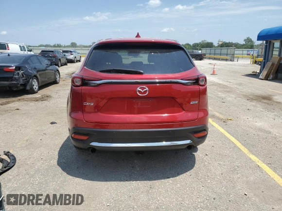2016 Mazda CX-9 Grand Touring with VIN JM3TCADY6G0105783, listed as a Copart auction lot 63975195 with 135,972 mi miles and Salvage title. Bid and sale history available at DreamBid. Image 6.