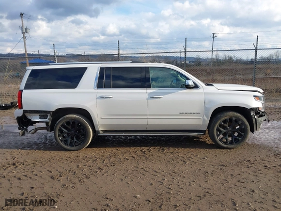 2017 Chevrolet Suburban Premier with VIN 1GNSKJKC9HR406373, listed as a IAAI auction lot 41695349 with 99,863 mi miles. Bid and sale history available at carsss.com. Image 14.