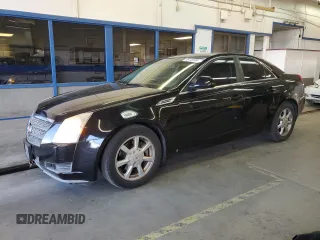 2009 Cadillac CTS RWD w/1SA with VIN 1G6DF577790147724, listed as a Copart auction lot 76749184 with 156,055 mi miles and Salvage Title. Bid and sale history available at carsss.com. Image 1.