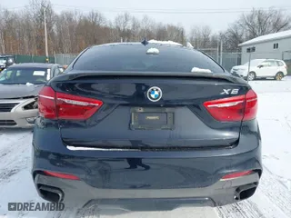 2015 BMW X6 xDrive50i with VIN 5UXKU6C54F0F94383, listed as a IAAI auction lot 41467773 with 114,560 mi miles. Bid and sale history available at carsss.com. Image 16.