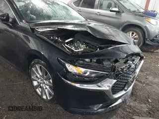 2023 Mazda 3 S Preferred with VIN 3MZBPACM0PM352430, listed as a IAAI auction lot 41738230 with 17,632 mi miles and . Bid and sale history available at DreamBid. Image 6.
