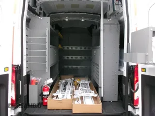 2023 Ford Transit Cargo with VIN 1FTBR1X86PKC01190, listed as a IAAI auction lot 42808925 with 41 mi miles and . Bid and sale history available at DreamBid. Image 4.