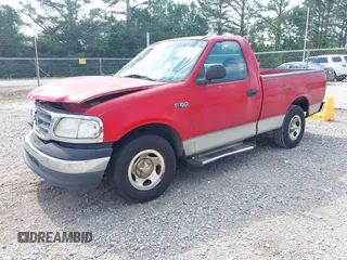 2000 Ford F-150 XL with VIN 1FTZF1720YNB66858, listed as a IAAI auction lot 42302193 with Not provided miles and . Bid and sale history available at DreamBid. Image 2.