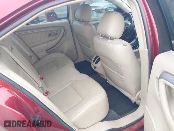 2015 Ford Taurus SEL with VIN 1FAHP2E8XFG137526, listed as a IAAI auction lot 41909658 with 147,992 mi miles and . Bid and sale history available at carsss.com. Image 8.