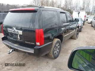 2009 Cadillac Escalade z VIN 1GYFK13269R147563, wystawiony jako IAAI lot #41462689 z przebiegiem 210 095 mil mil oraz . Historia ofert i sprzedaży dostępna na DreamBid. Obrazek 4.