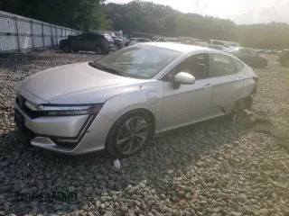 2018 Honda Clarity z VIN JHMZC5F14JC017054, wystawiony jako Copart lot #65295514 z przebiegiem 74 498 mil mil oraz Szkoda całkowita • Salvage title. Historia ofert i sprzedaży dostępna na DreamBid. Obrazek 1.