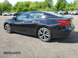 2018 Nissan Maxima SV with VIN 1N4AA6AP6JC401283, listed as a Copart auction lot 57285845 with 71,717 mi miles and Clean title. Bid and sale history available at DreamBid. Image 2.