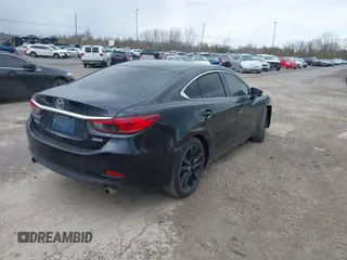 2014 Mazda Mazda6 i Touring with VIN JM1GJ1V68E1128650, listed as a IAAI auction lot 42035713 with 171,609 mi miles. Bid and sale history available at carsss.com. Image 4.
