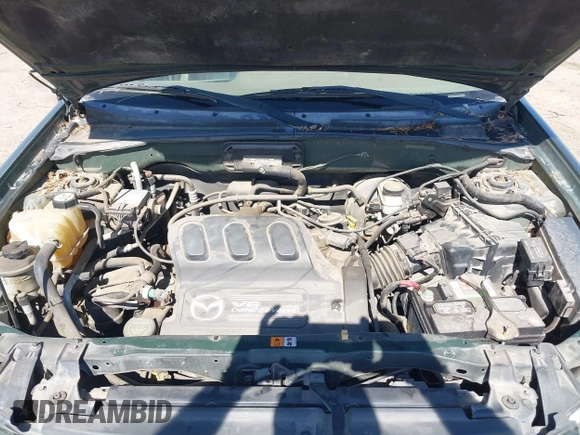2002 Mazda Tribute LX with VIN 4F2CU08152KM02067, listed as a IAAI auction lot 42198970 with 212,613 mi miles and . Bid and sale history available at carsss.com. Image 10.