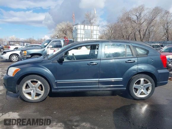 2007 Dodge Caliber R/T with VIN 1B3HE78K87D541675, listed as a IAAI auction lot 41692797 with 216,861 mi miles and . Bid and sale history available at DreamBid. Image 14.