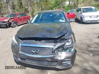 2014 Infiniti Q50 Premium with VIN JN1BV7ARXEM684719, listed as a IAAI auction lot 42122949 with 126,656 mi miles and . Bid and sale history available at DreamBid. Image 12.