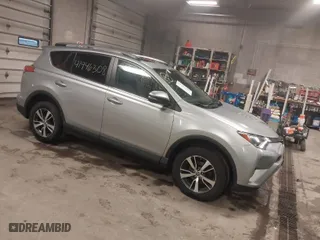 2017 Toyota RAV4 XLE with VIN 2T3RFREV3HW555319, listed as a IAAI auction lot 41946308 with 134,073 mi miles. Bid and sale history available at carsss.com. Image 1.