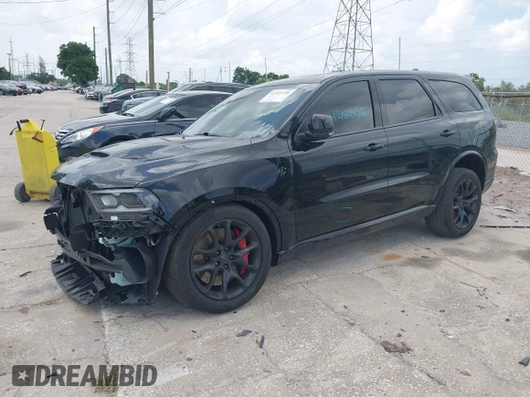2023 Dodge Durango SRT Hellcat Premium with VIN 1C4SDJH9XPC554953, listed as a IAAI auction lot 42375728 with 19,492 mi miles and . Bid and sale history available at DreamBid. Image 2.