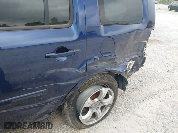 2015 Honda Pilot EX-L with VIN 5FNYF4H56FB040909, listed as a IAAI auction lot 42028609 with 267,375 mi miles and . Bid and sale history available at carsss.com. Image 6.