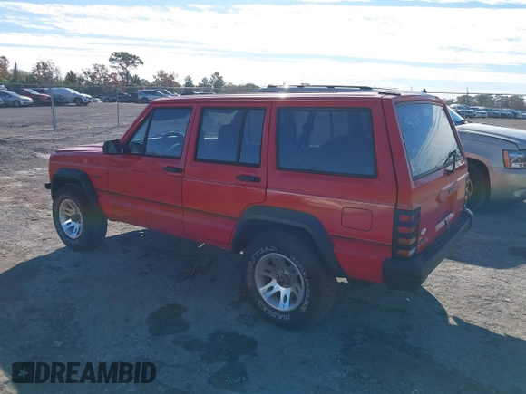 1996 Jeep Cherokee SE with VIN 1J4FT28S0TL225891, listed as a IAAI auction lot 41411705 with 233,983 mi miles and . Bid and sale history available at DreamBid. Image 3.
