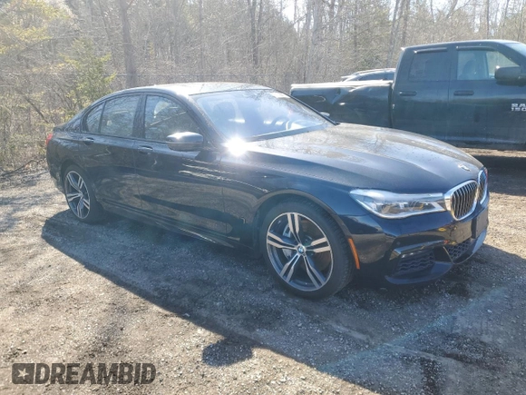2017 BMW 7 Series 750i xDrive with VIN WBA7B0C55HG527032, listed as a Copart auction lot 52026415 with 67,722 mi miles and Clean title. Bid and sale history available at DreamBid. Image 4.