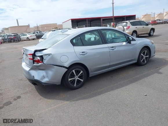 2021 Subaru Impreza Premium with VIN 4S3GKAV67M3607643, listed as a IAAI auction lot 41601168 with 25,703 mi miles. Bid and sale history available at carsss.com. Image 4.