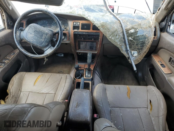 1997 Toyota 4Runner SR5 z VIN JT3HN86R4V0073022, wystawiony jako Copart lot #57112245 z przebiegiem 220 732 mil mil oraz Szkoda całkowita • Salvage title. Historia ofert i sprzedaży dostępna na DreamBid. Obrazek 8.