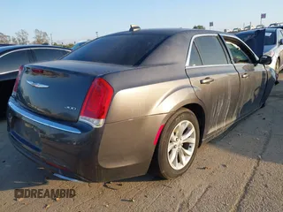 2016 Chrysler 300 Anniversary Edition with VIN 2C3CCAAG7GH211860, listed as a IAAI auction lot 41562358 with Not Provided miles and . Bid and sale history available at DreamBid. Image 4.