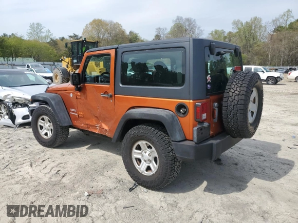 2011 Jeep Wrangler Sport with VIN 1J4AA2D15BL574234, listed as a Copart auction lot 52952605 with 114,642 mi miles and Salvage Title. Bid and sale history available at carsss.com. Image 2.