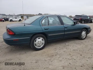 1997 Chevrolet Lumina LS with VIN 2G1WL52M3V9163567, listed as a Copart auction lot 82772324 with 191,852 mi miles and Salvage Title. Bid and sale history available at DreamBid. Image 3.