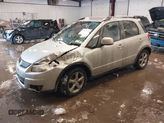 2009 Suzuki SX4 Man Touring Pkg AWD with VIN JS2YB417X95100192, listed as a IAAI auction lot 41618761 with 172,687 mi miles. Bid and sale history available at carsss.com. Image 2.